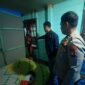 Anggota Kepolisian Polsek Palmatak melakukan olah TKP