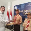 Dua dari Tiga anak binaan di Lembaga Pembinaan Khusus Anak (LPKA) Batam menghirup udara bebas setelah menerima Pengurangan Masa Pidana (PMP) atau remisi dalam rangka peringatan Hari Anak Nasional (HAN) 2026, Kamis (23/7/2026).